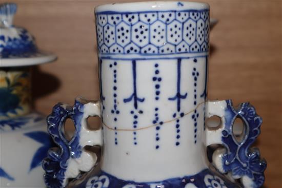 A large collection of 19th century Chinese blue and white vases, bowls, etc. and two famille rose pots